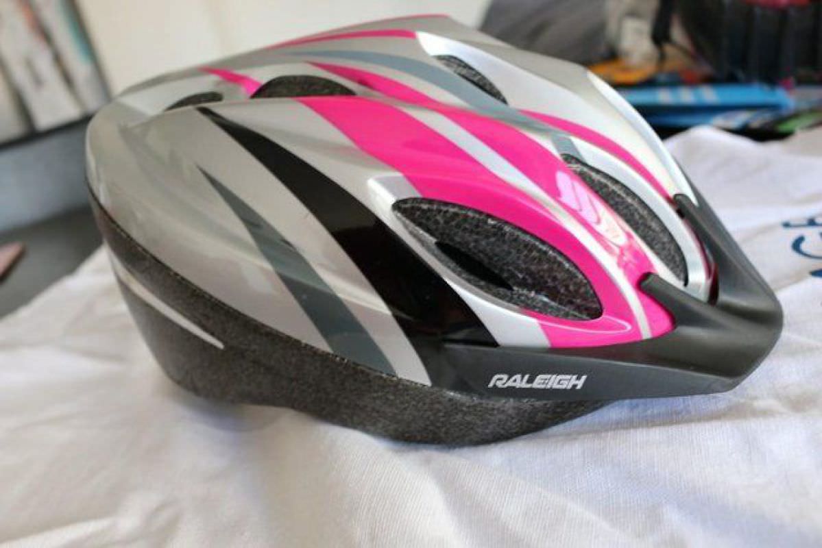 Raleigh Cycle Helmet. Medium. Silver-Pink. Used Twice